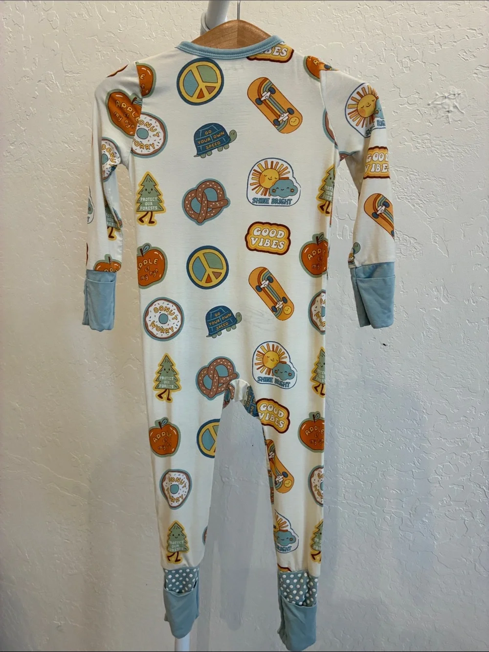 Angel Dear Cream One-Piece Footie Pajamas with Blue Trim and Yellow Accents